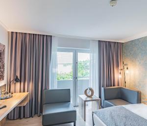 Postel nebo postele na pokoji v ubytování Parkhotel Sonnenberg