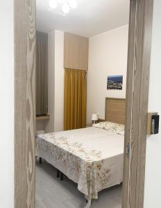 Posteľ alebo postele v izbe v ubytovaní Sissi Comfort Rooms Foresteria Lombarda