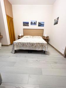 Posteľ alebo postele v izbe v ubytovaní Sissi Comfort Rooms Foresteria Lombarda