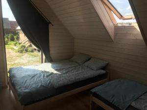 Postel nebo postele na pokoji v ubytování NORBEA Domek na Łąkowej