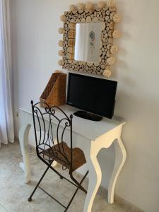 TV a/nebo společenská místnost v ubytování Casa de playa