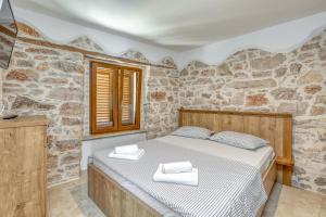 Postel nebo postele na pokoji v ubytování Casa Viktor