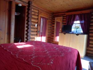 Katil atau katil-katil dalam bilik di Seven Dwarfs Cabin - On The Brook Cabins