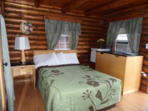 Katil atau katil-katil dalam bilik di Seven Dwarfs Cabin - On The Brook Cabins