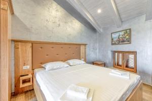 Postel nebo postele na pokoji v ubytování Casa Viktor