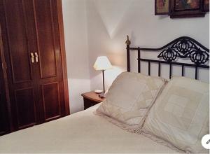 Posteľ alebo postele v izbe v ubytovaní Casa Rural Los Olmos