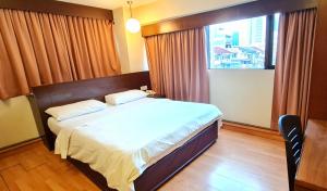 Postel nebo postele na pokoji v ubytování PP Hotel