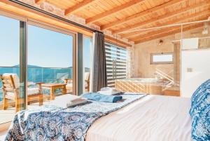 A bed or beds in a room at Villa Ambar