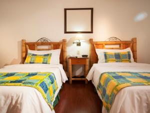 Postel nebo postele na pokoji v ubytování Armenia Hotel