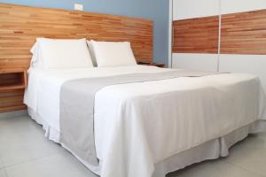 Cama ou camas em um quarto em Hotel Florinda