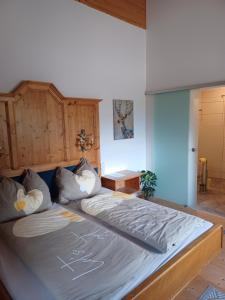 Llit o llits en una habitació de B&B Margit's Ranch Urlaub am Pferdehof