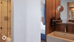 Koupelna v ubytování Grandi by Center Hotels