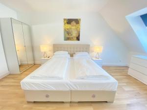 Posteľ alebo postele v izbe v ubytovaní Steiner Residences Vienna Nestroyplatz