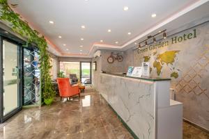 a lobby of a green garden hotel with a reception counter at Green Garden Hotel in Istanbul