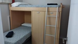 Postel nebo postele na pokoji v ubytování Sansoain Jaca