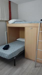 Postel nebo postele na pokoji v ubytování Sansoain Jaca