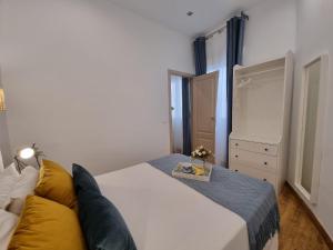 Postel nebo postele na pokoji v ubytování APARTAMENTOS SAN ANDRES