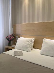 Postel nebo postele na pokoji v ubytování Laurus Motel Airport Tuzla