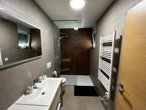 Koupelna v ubytování Merlo APP + 20 fotografií