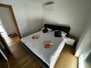 Postel nebo postele na pokoji v ubytování Merlo APP