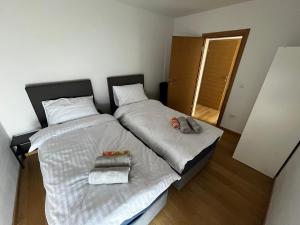 Postel nebo postele na pokoji v ubytování Merlo APP
