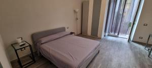 Posteľ alebo postele v izbe v ubytovaní Centonze Apt - Messina centro