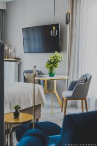 Royal Tulip Warsaw Centre的电视和/或娱乐中心