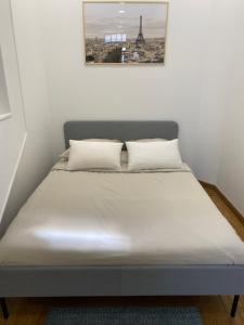 Posteľ alebo postele v izbe v ubytovaní Le Roofound - Porte de Paris - Métro à 5min - Entrée personnelle
