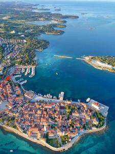 an aerial view of a small island in the water at Apartment Porto Poreč in Poreč