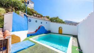 The swimming pool at or close to Villa Carlitos Comares by Ruralidays