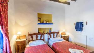 A bed or beds in a room at Villa Carlitos Comares by Ruralidays