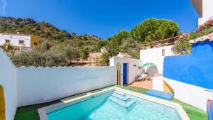 The swimming pool at or close to Villa Carlitos Comares by Ruralidays