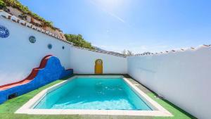 The swimming pool at or close to Villa Carlitos Comares by Ruralidays