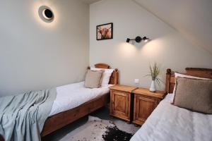 Postel nebo postele na pokoji v ubytování Hotel Pernigele