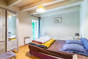 Postel nebo postele na pokoji v ubytování Nature - Étang privé - Charme et repos