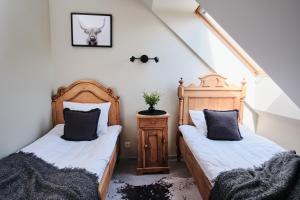 Postel nebo postele na pokoji v ubytování Hotel Pernigele
