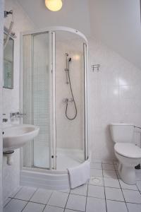 Koupelna v ubytování Hotel Pernigele
