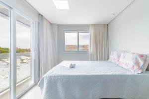 Postel nebo postele na pokoji v ubytování SA06 Excelente Casa 5 Suítes - Reserva de Sauípe