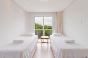 Postel nebo postele na pokoji v ubytování SA06 Excelente Casa 5 Suítes - Reserva de Sauípe