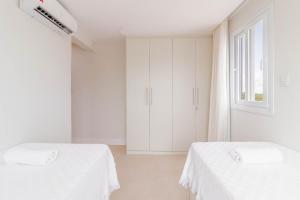 Postel nebo postele na pokoji v ubytování SA06 Excelente Casa 5 Suítes - Reserva de Sauípe