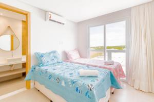 Postel nebo postele na pokoji v ubytování SA06 Excelente Casa 5 Suítes - Reserva de Sauípe
