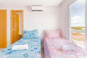 Postel nebo postele na pokoji v ubytování SA06 Excelente Casa 5 Suítes - Reserva de Sauípe