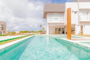 Bazén v ubytování SA06 Excelente Casa 5 Suítes - Reserva de Sauípe nebo v jeho okolí