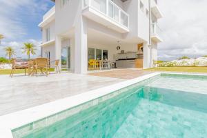 Bazén v ubytování SA06 Excelente Casa 5 Suítes - Reserva de Sauípe nebo v jeho okolí