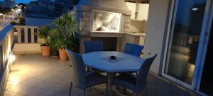 Balkón alebo terasa v ubytovaní Happy Basset Terrace + 22 fotografií