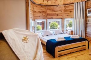 Posteľ alebo postele v izbe v ubytovaní Skansen Bicz Resort