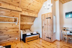 Posteľ alebo postele v izbe v ubytovaní Skansen Bicz Resort
