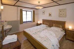 A bed or beds in a room at Ristorante della Stazione