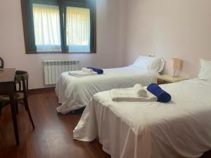 Posteľ alebo postele v izbe v ubytovaní Casa con encanto en Gondomar con piscina