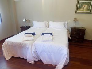 Posteľ alebo postele v izbe v ubytovaní Casa con encanto en Gondomar con piscina